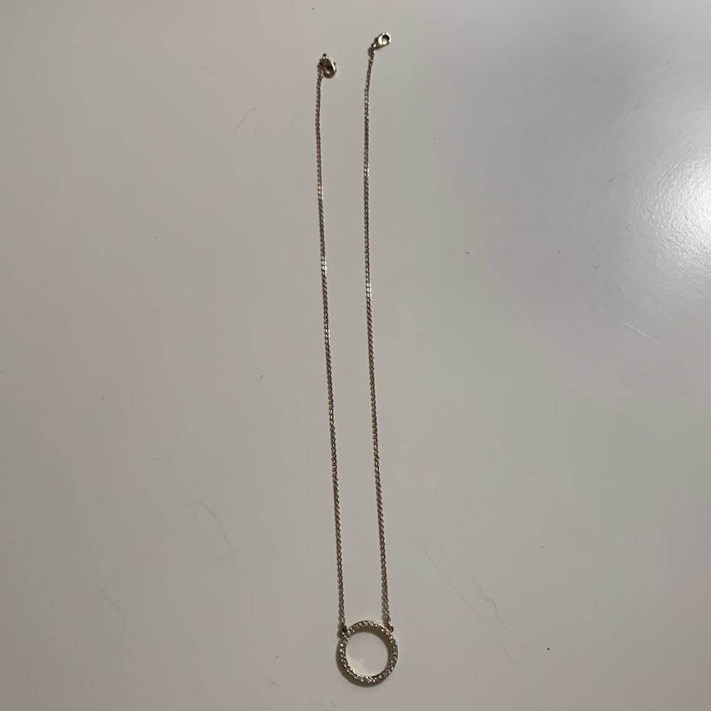 Necklace with sparkly pendant